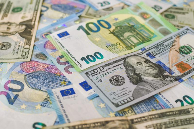Dollars and Euro bills