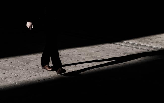 Man walking in the shadow 